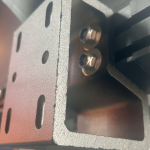 Custom awning brackets mounted to a hardshell rooftop tent, offering a secure and streamlined way to attach a freestanding or shower awning